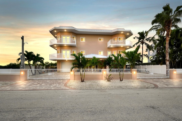 view of front facade with a balcony