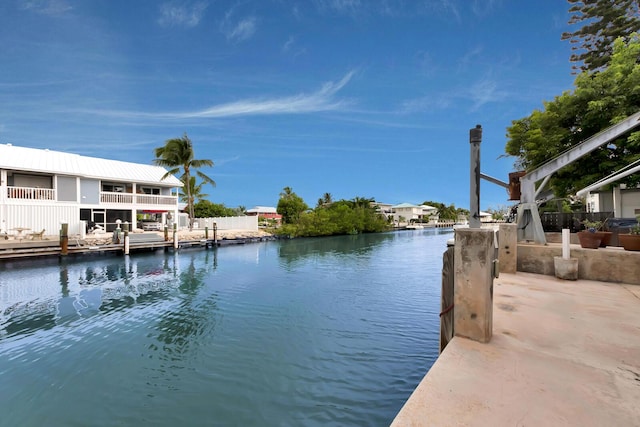 dock area with a water view