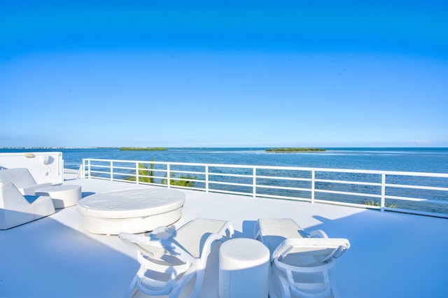 view of patio / terrace with a water view