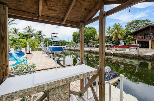 dock area with a water view