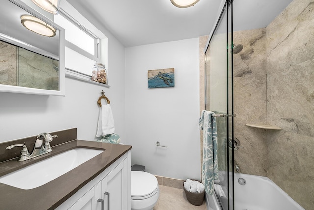 full bathroom with enclosed tub / shower combo, vanity, tile patterned floors, and toilet