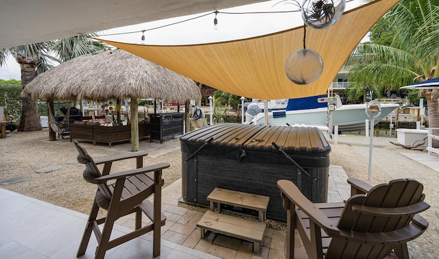 view of patio featuring a gazebo and outdoor lounge area