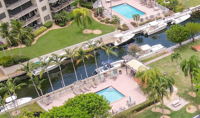 birds eye view of property featuring a water view