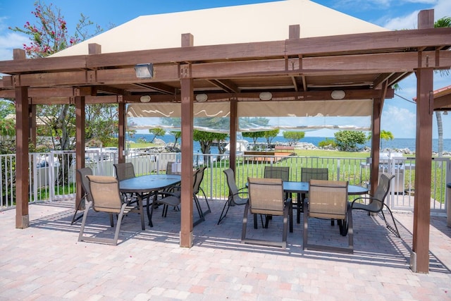 view of patio / terrace featuring a water view