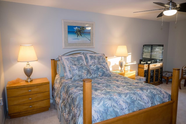 bedroom featuring ceiling fan and light colored carpet