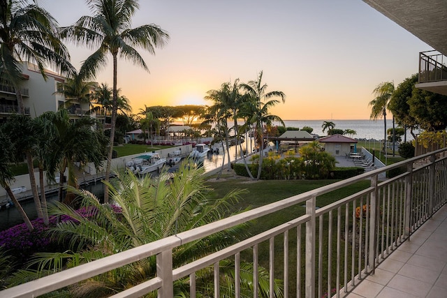 balcony at dusk with a water view