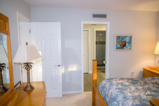 bedroom featuring ensuite bathroom