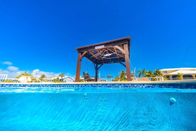 view of pool featuring a gazebo