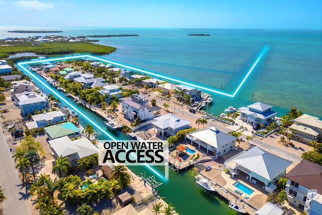 943 Flagship Dr, Summerland, FL 33042 - birds eye view of property featuring a water view and a residential view