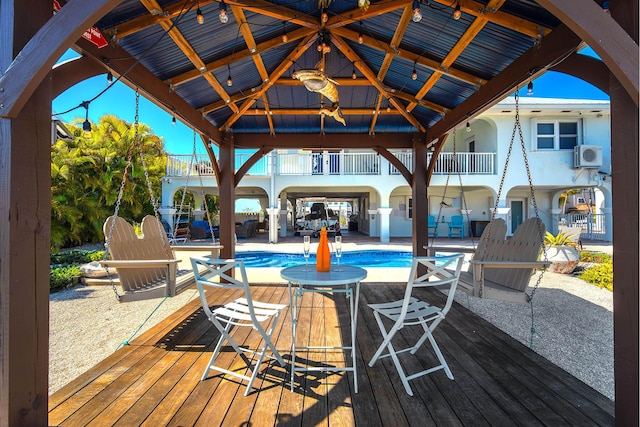 exterior space with a gazebo and a wooden deck