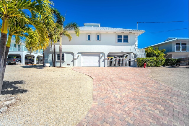 view of front of property featuring a garage