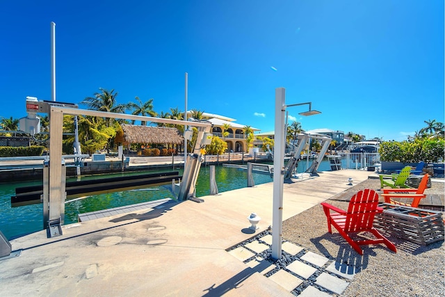 dock area featuring a water view