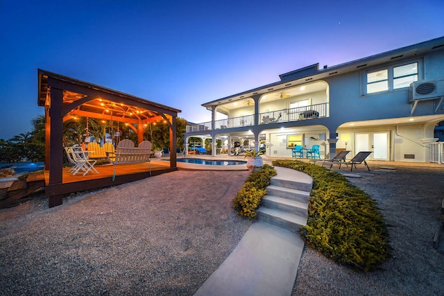 view of community featuring a pool and a patio area