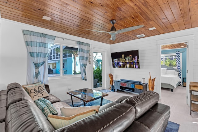 living room with wooden ceiling and ceiling fan