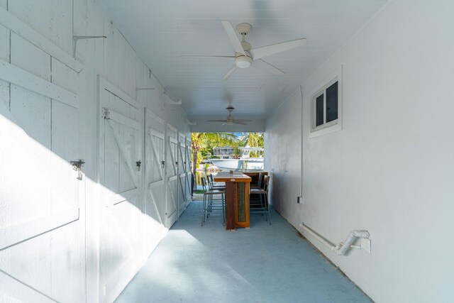 view of patio featuring ceiling fan