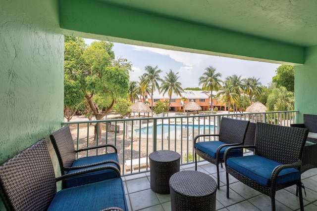 balcony featuring a patio area