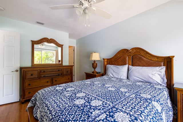 bedroom featuring wood-type flooring and ceiling fan