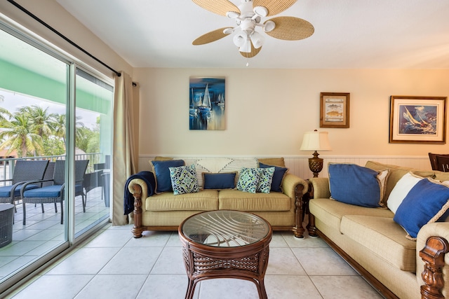 living room with light tile patterned flooring and ceiling fan