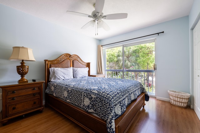 bedroom featuring wood-type flooring and ceiling fan