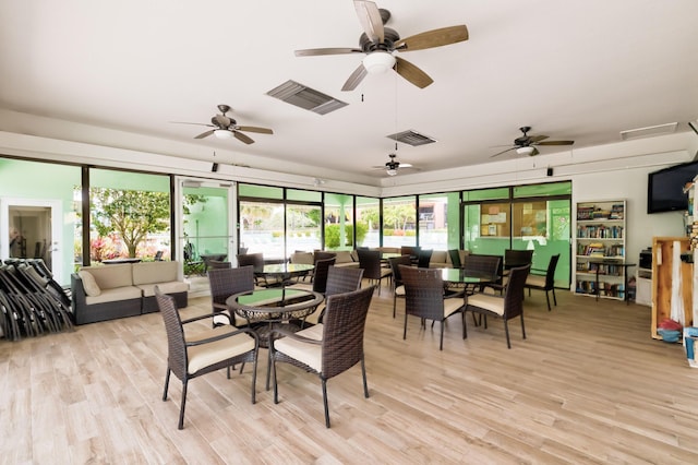 dining room featuring light wood-type flooring