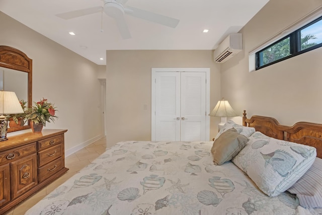 bedroom featuring a wall mounted air conditioner, a ceiling fan, recessed lighting, light tile patterned floors, and a closet