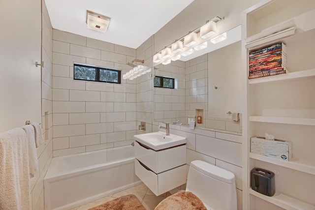 full bath featuring toilet, tile patterned floors, bathing tub / shower combination, and vanity