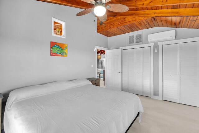 bedroom featuring lofted ceiling with beams, wooden ceiling, a wall unit AC, visible vents, and two closets