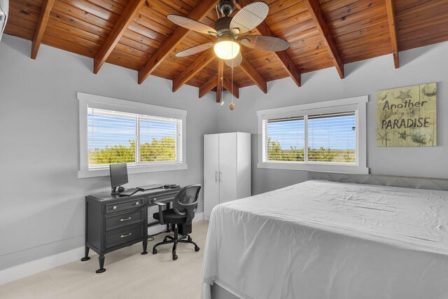 bedroom with wooden ceiling, multiple windows, and vaulted ceiling with beams