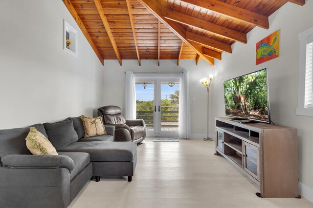 living room with lofted ceiling with beams, light wood-style flooring, wood ceiling, baseboards, and french doors