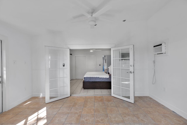 1513 5th St, Key West, FL 33040 - bedroom featuring french doors, a wall mounted AC, and baseboards