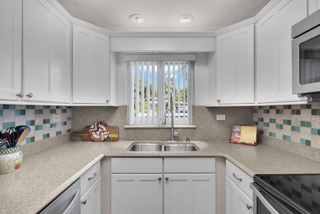 1513 5th St, Key West, FL 33040 - kitchen featuring a sink, appliances with stainless steel finishes, and white cabinets