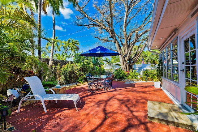 1513 5th St, Key West, FL 33040 - wooden terrace featuring a fenced backyard and outdoor dining space