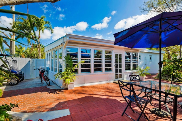 1513 5th St, Key West, FL 33040 - rear view of property with a patio, fence, and outdoor dining area