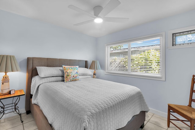 1513 5th St, Key West, FL 33040 - bedroom featuring light tile patterned floors, baseboards, and ceiling fan