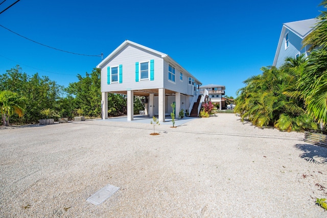 exterior space with a carport