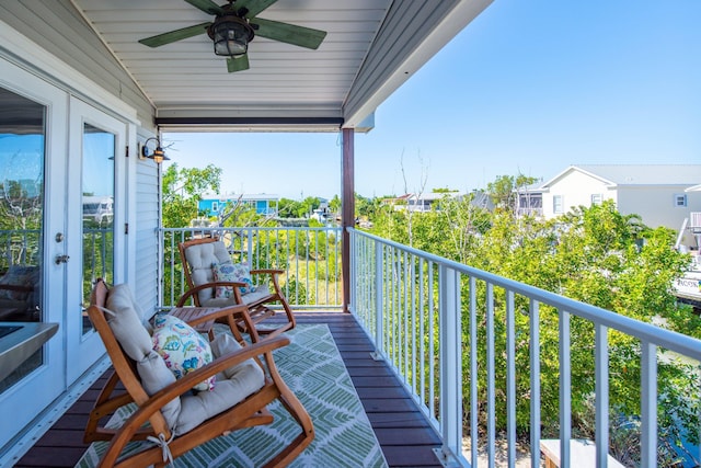 balcony featuring french doors and ceiling fan