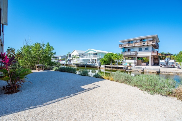 exterior space with a water view