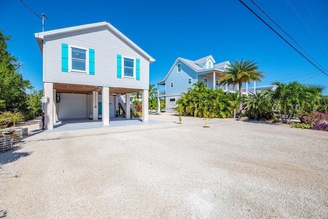 view of front of house featuring a carport