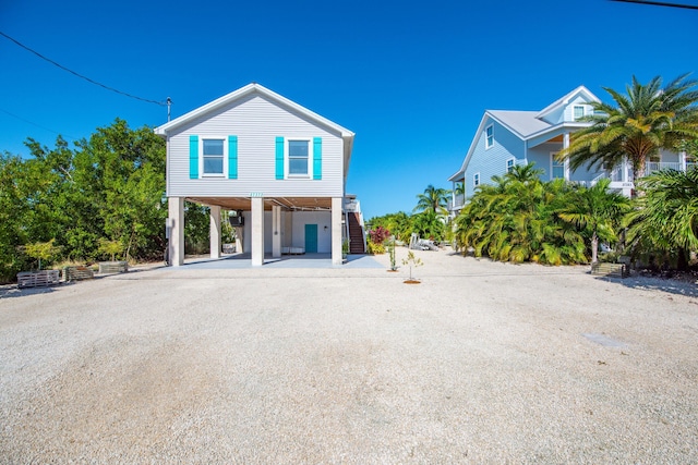 view of front of house with a carport