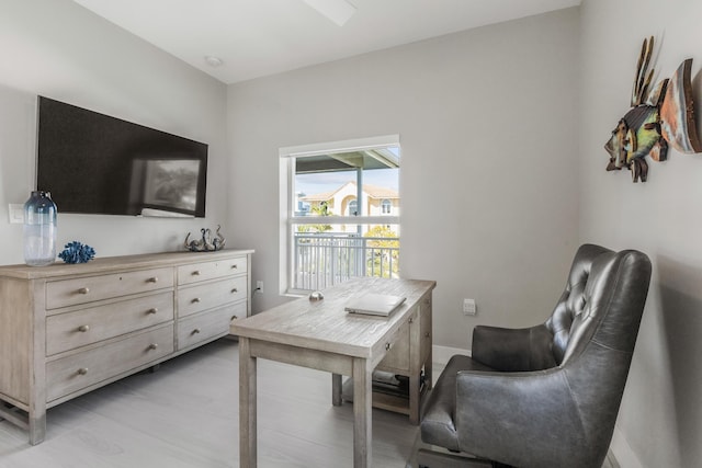 home office featuring light hardwood / wood-style floors