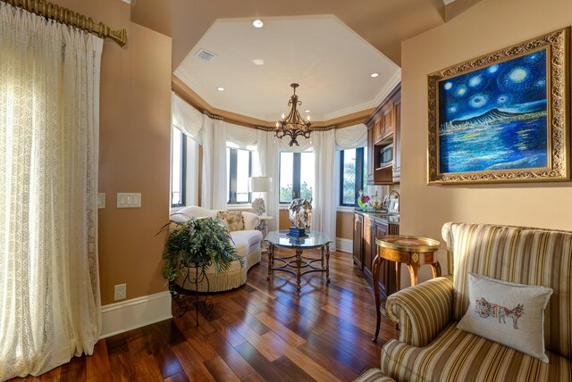 30 Cannon Royal Dr, Shark Key, FL 33040 - living area with visible vents, crown molding, dark wood-style flooring, baseboards, and a chandelier
