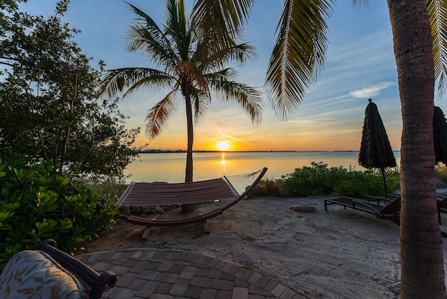 30 Cannon Royal Dr, Shark Key, FL 33040 - patio terrace at dusk featuring a water view