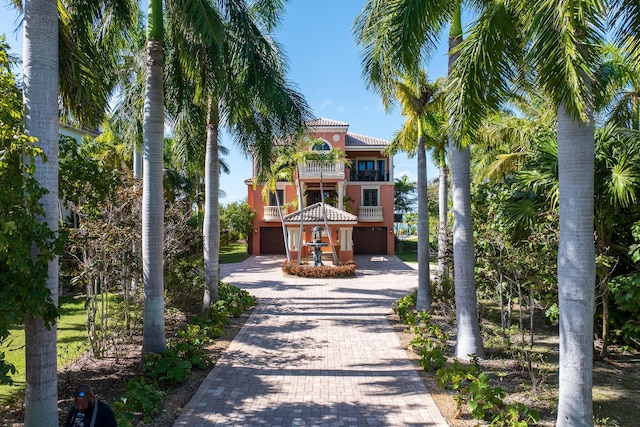 30 Cannon Royal Dr, Shark Key, FL 33040 - view of front facade with decorative driveway and a balcony