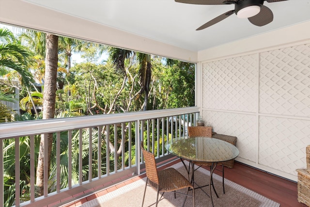 sunroom / solarium with ceiling fan