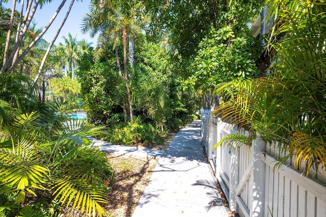 view of community with fence