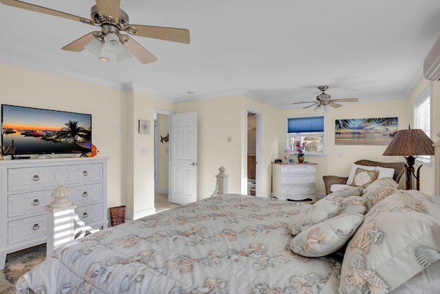 bedroom with ornamental molding and a ceiling fan