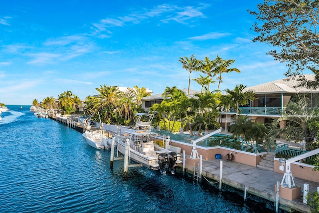 dock area with a water view