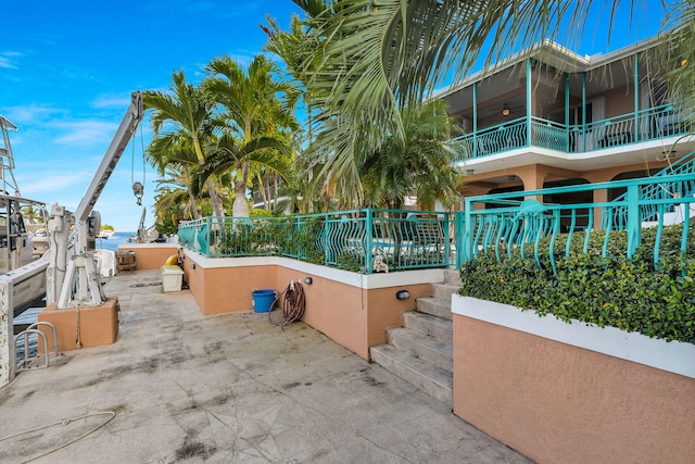 exterior space featuring a patio and fence