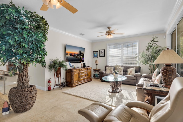 living area featuring ceiling fan, visible vents, ornamental molding, and baseboards