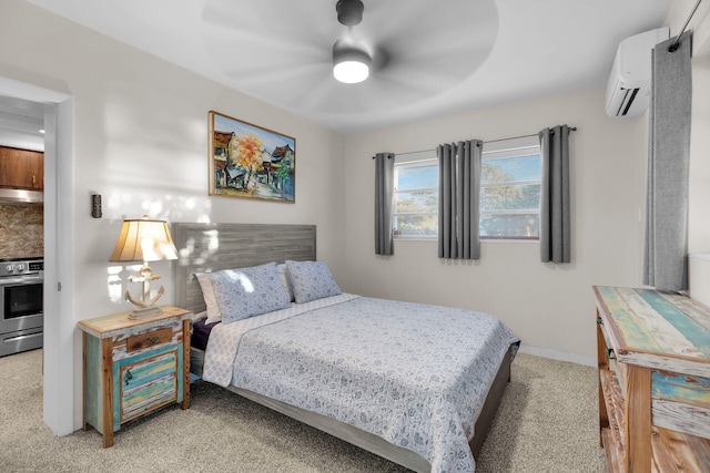 carpeted bedroom featuring a wall mounted air conditioner and ceiling fan